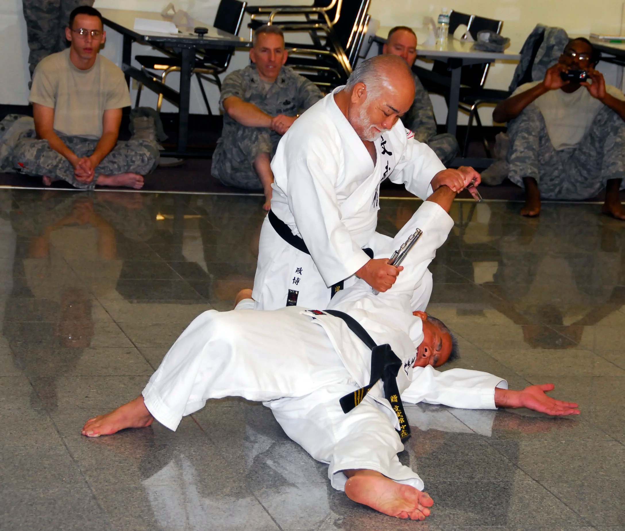 Hanshi 10th Dan Masahiro Nakamoto generously helps this Karateka with his Yoga Practice